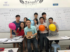 Mr Soon with students celebrating in class